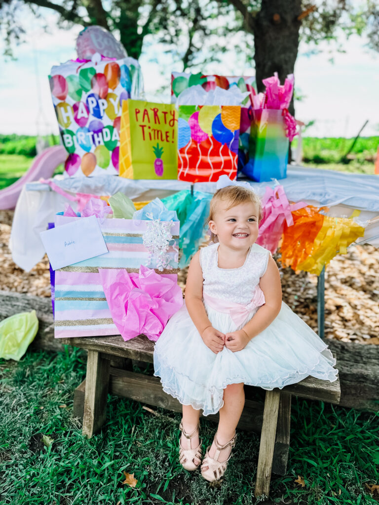 Birthday girl with presents