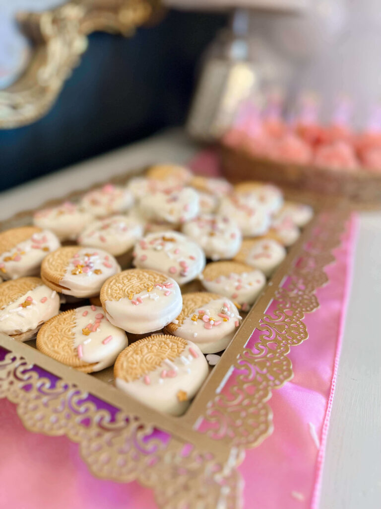 Golden Oreos dipped in white chocolate